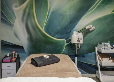 Relaxing treatment room at Swoon Beauty & Aesthetics in Ballito, Kwazulu-natal, ZA with serene decor and amenities.