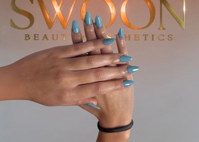 Blue manicured nails at Swoon Beauty & Aesthetics, Ballito, Kwazulu-natal, ZA, showcasing modern elegance.