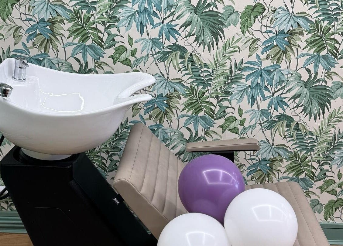 Modern hair wash station at Beauty Studio By K, St. Neots, England, GB with tropical wallpaper and balloons.