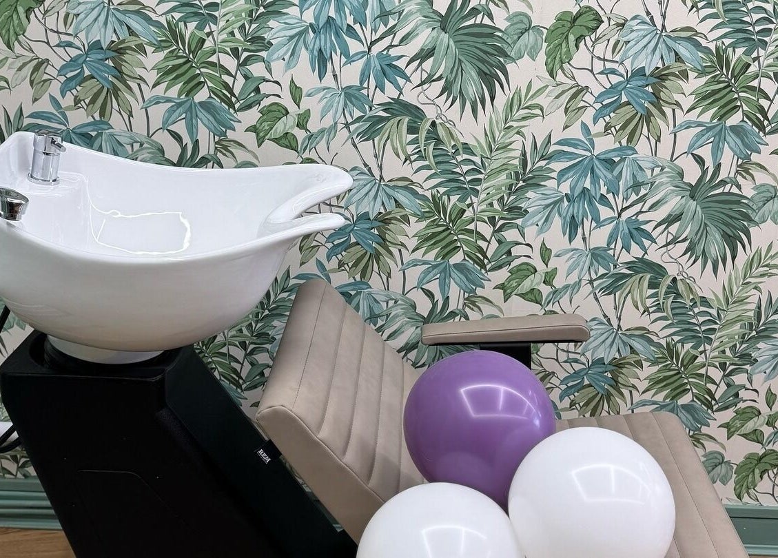 Modern hair wash station at Beauty Studio By K, St. Neots, England, GB with tropical wallpaper and balloons.