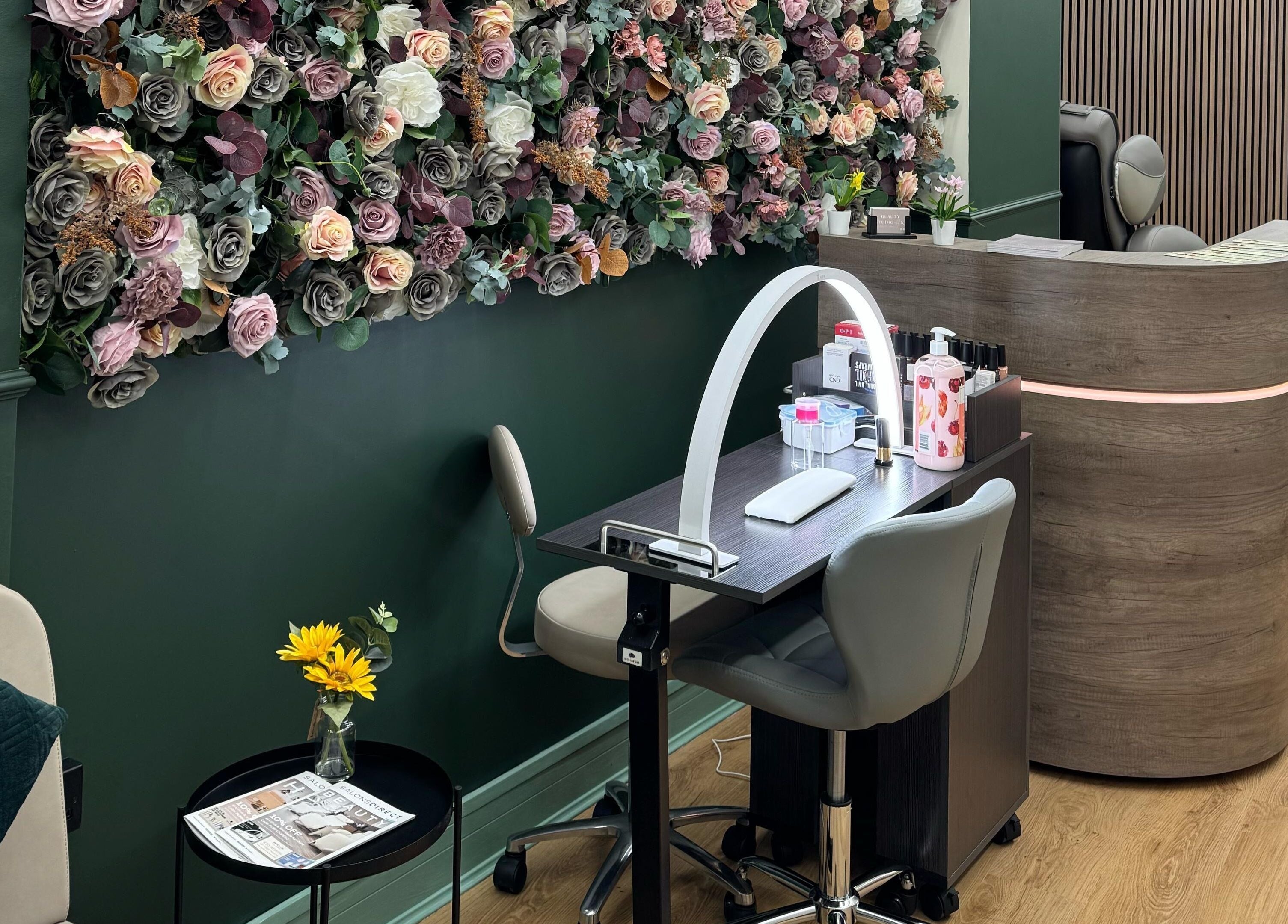 Elegant nail station and floral decor at Beauty Studio By K, St. Neots, England, GB.