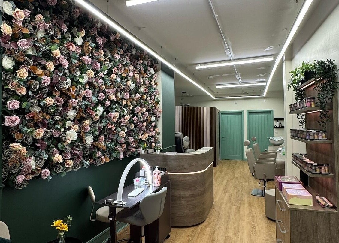 Elegant floral wall at Beauty Studio By K in St. Neots, England, GB. Stylish salon interior for beauty treatments.