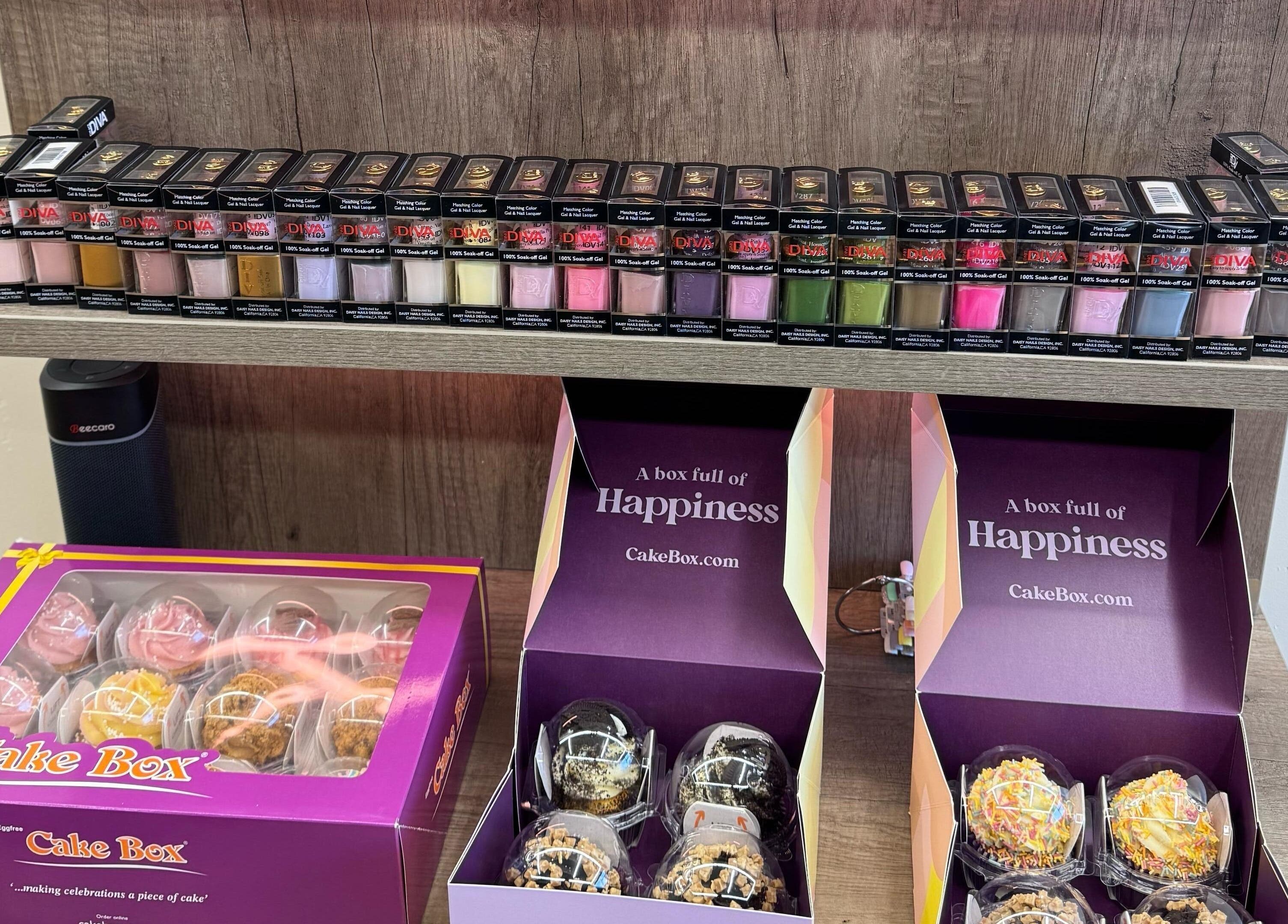Nail polish and colorful Cake Box at Beauty Studio By K, St. Neots, England, GB.