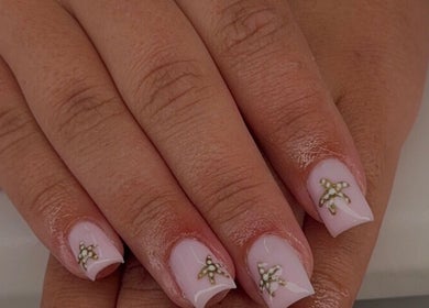 Detailed manicure with delicate gold accents at Serenity Beauty Studio, Ashton-in-Makerfield, England, GB.