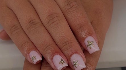 Detailed manicure with delicate gold accents at Serenity Beauty Studio, Ashton-in-Makerfield, England, GB.