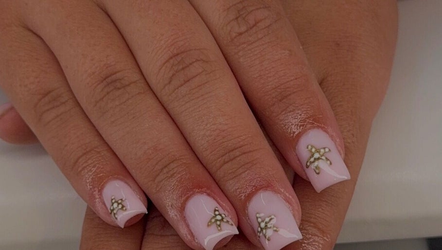 Elegant nail art with floral design at Serenity Beauty Studio, Ashton-in-makerfield, England, GB.
