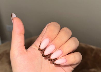 Elegant French tip nails at Serenity Beauty Studio, Ashton-in-Makerfield, England, GB. Perfect for a classy look.