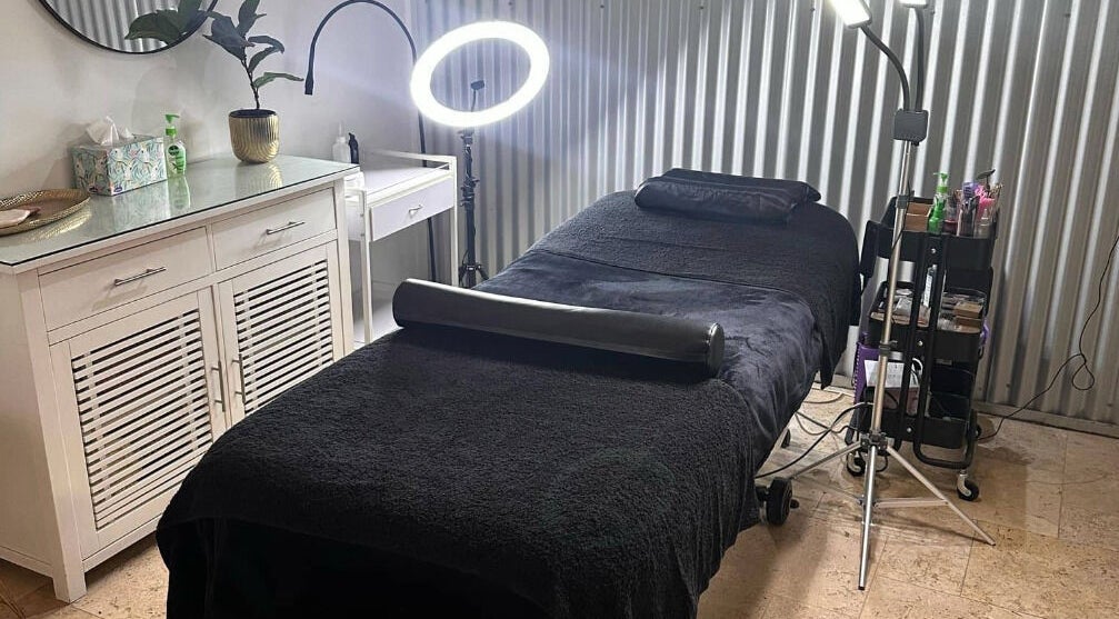 Elegant spa room at LX Eyelash Studio in Mandurah, Western Australia, AU, featuring a cozy treatment bed.