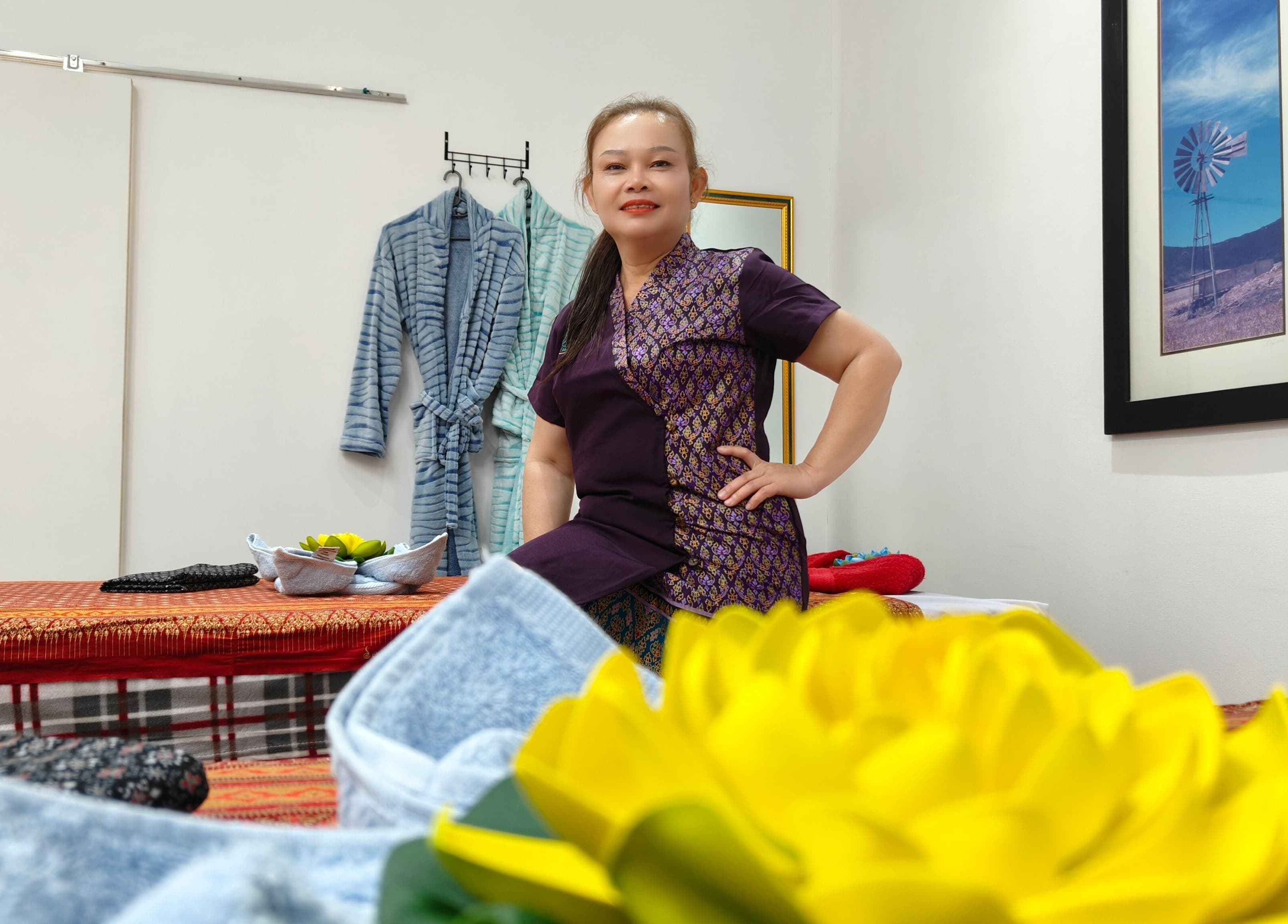 Inside Lek Ka Thai Massage Studio, Cape Town, showing therapist and soothing decor in Western Cape, ZA.