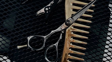 Elegant scissors with a comb at Simply, Gabriella, Newcastle, New South Wales, AU.