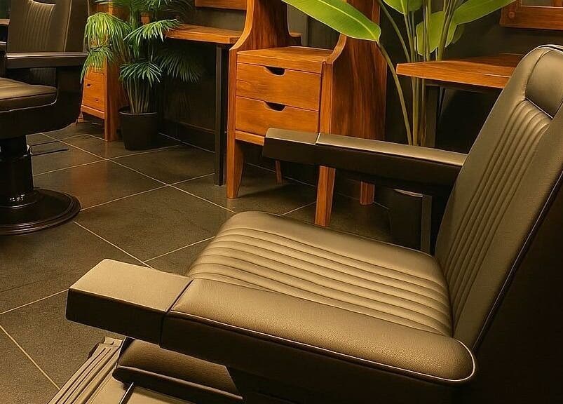 Luxurious leather barber chair at Wild Barber Boat Avenue, Choeng Thale, Phuket, TH, showcasing comfort and style.