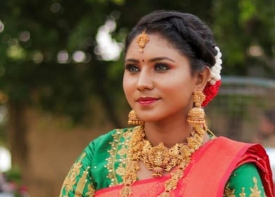 Woman in vibrant attire at Gnc, Chennai, Tamil Nadu, IN, showcasing traditional elegance.