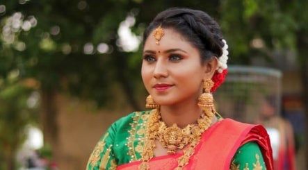 Woman in vibrant attire at Gnc, Chennai, Tamil Nadu, IN, showcasing traditional elegance.