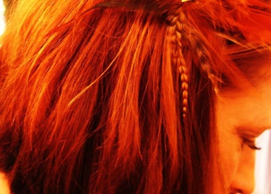 Elegant red hair braid style at Myla @Battle Born Beauty Salon, Topaz Ranch Estates, Nevada, US.