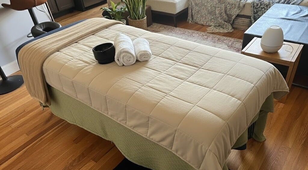 Luxurious spa bed at TherapeutiCare by Dex in Detroit, Michigan, US with plush towels and a calming atmosphere.