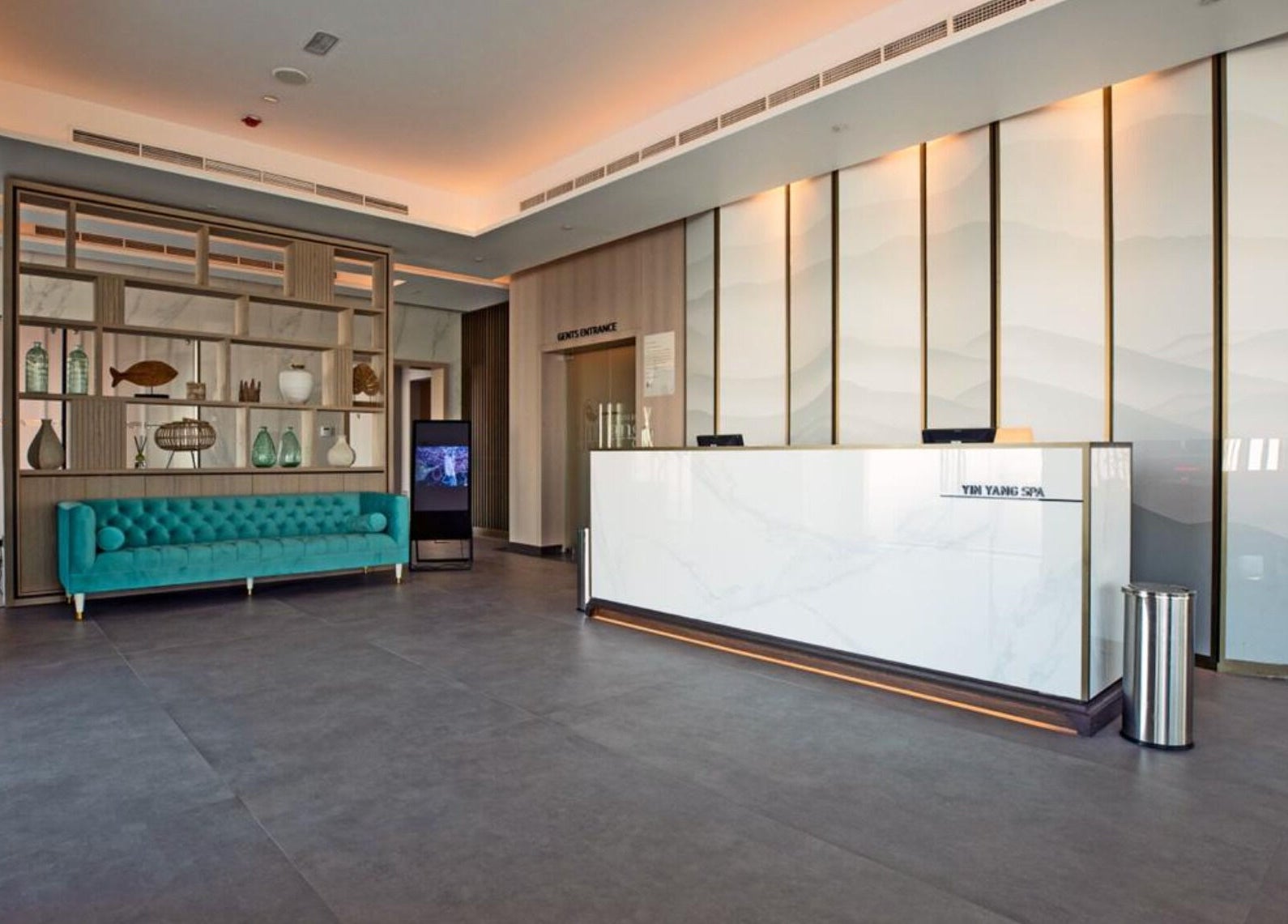 Elegant reception area at Yinyang Spa - Al Ferdous, Dubai, featuring chic decor and welcoming ambiance.