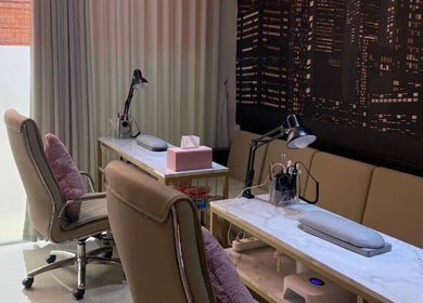 Elegant nail station at Le Naile Beauty Studio, Bali, Bali, ID, featuring plush chairs and stylish decor.
