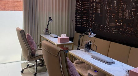 Elegant nail station at Le Naile Beauty Studio, Bali, Bali, ID, featuring plush chairs and stylish decor.