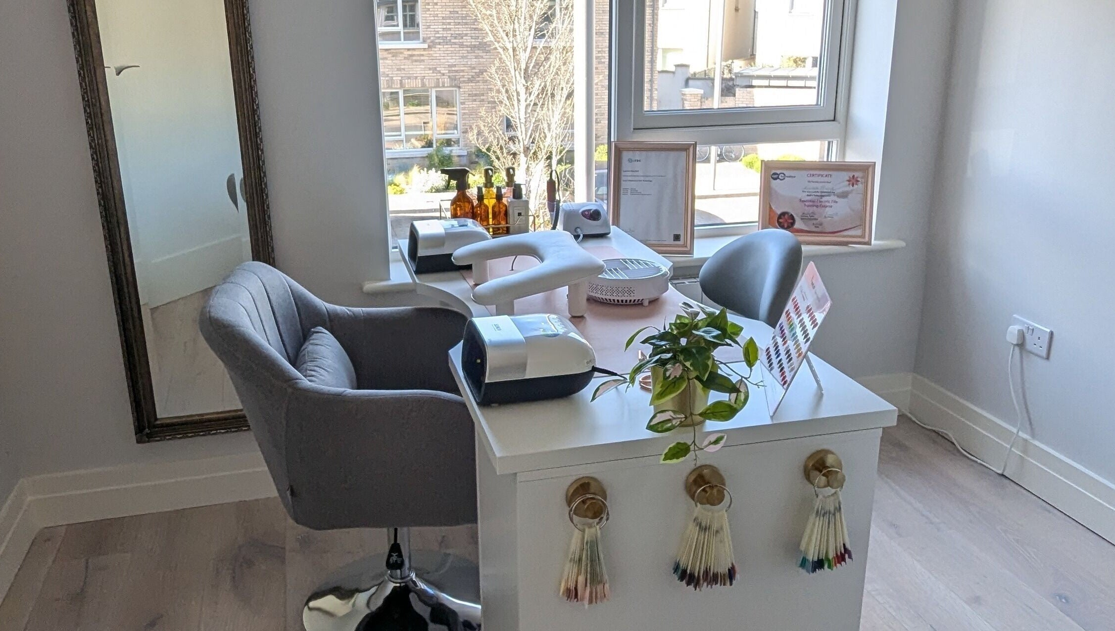 Modern nail workstation at Quest Nails, Greystones, County Wicklow, IE, showcasing elegant decor and equipment.