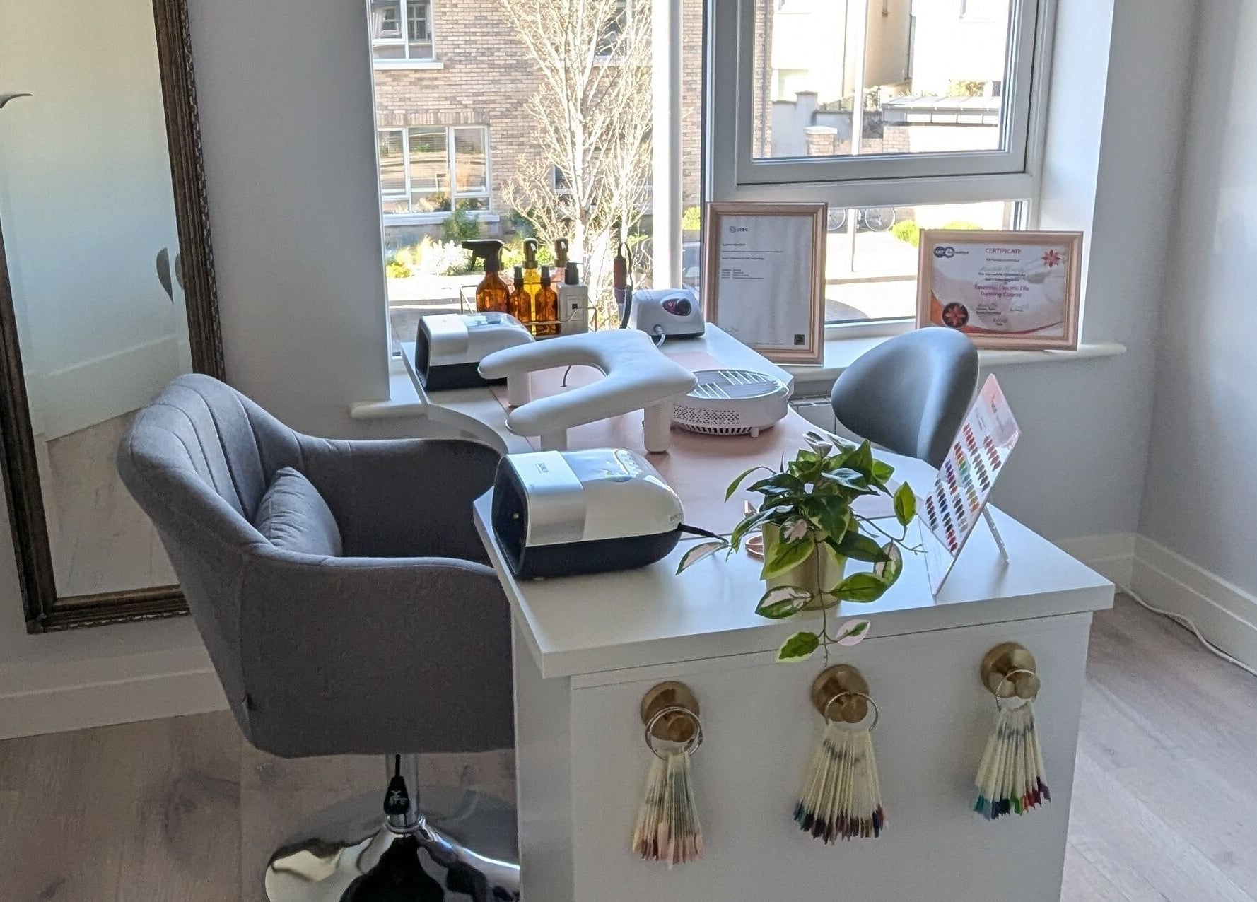 Modern nail workstation at Quest Nails, Greystones, County Wicklow, IE, showcasing elegant decor and equipment.