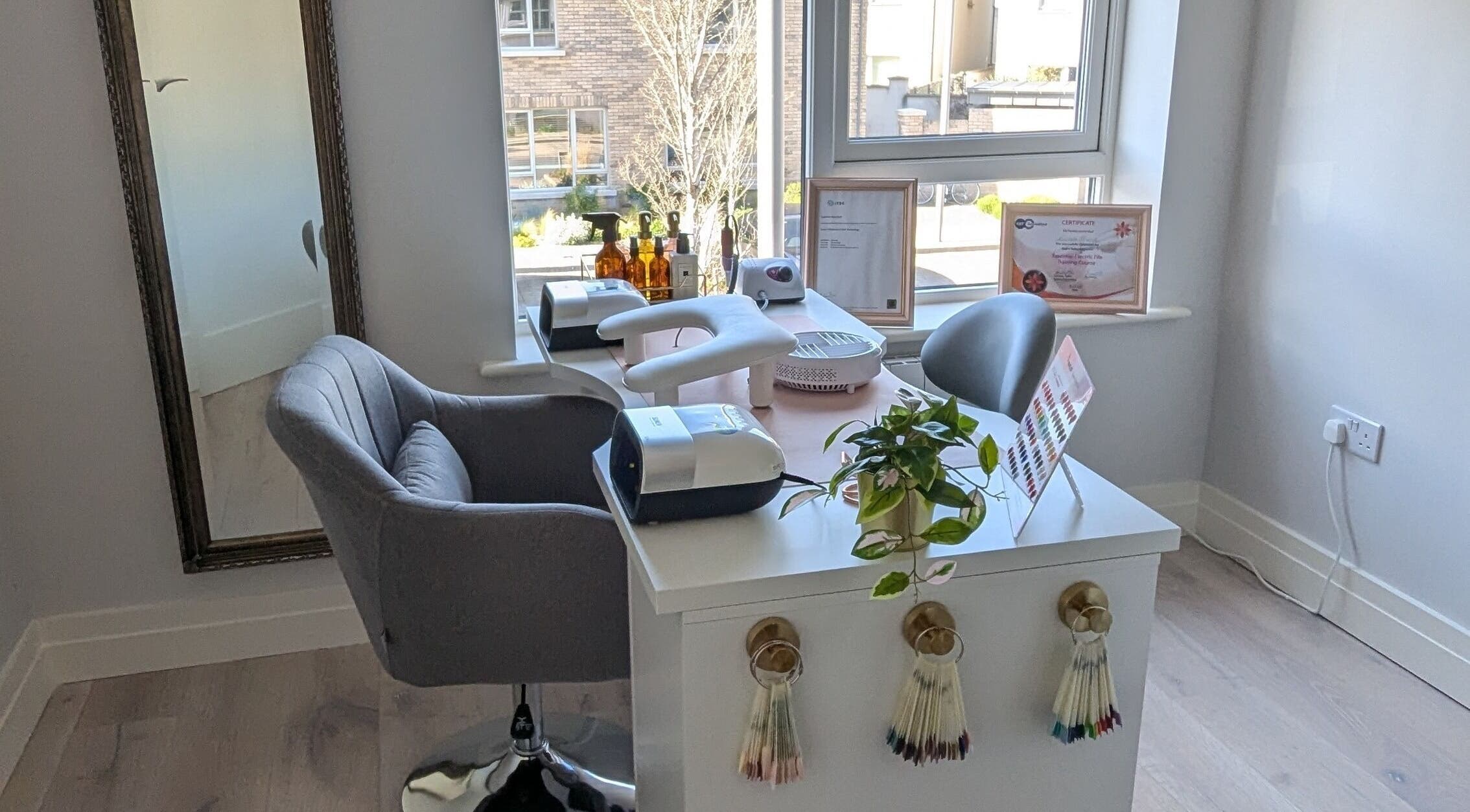 Modern nail workstation at Quest Nails, Greystones, County Wicklow, IE, showcasing elegant decor and equipment.