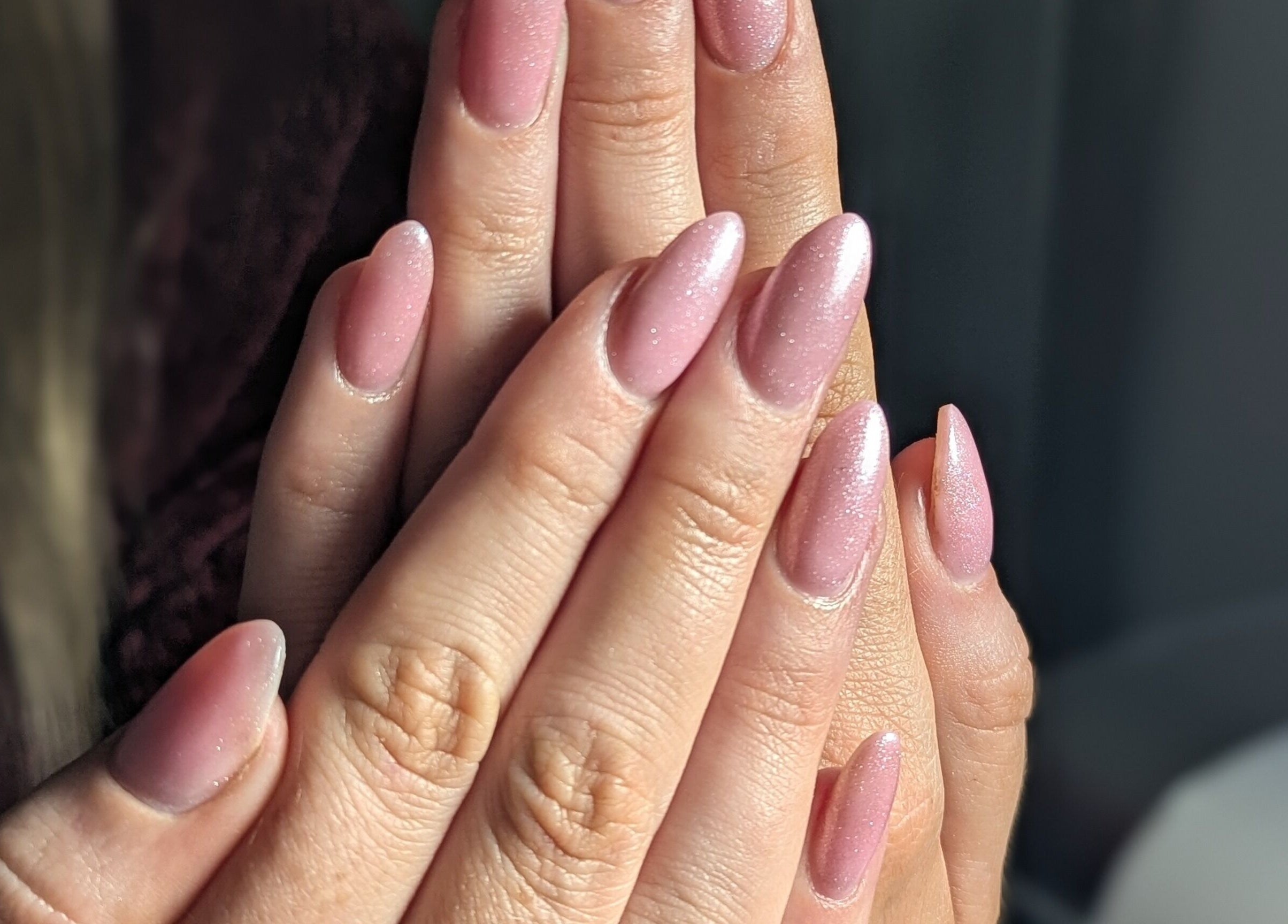 Close-up of sparkling pink nails at Quest Nails in Greystones, County Wicklow, IE.