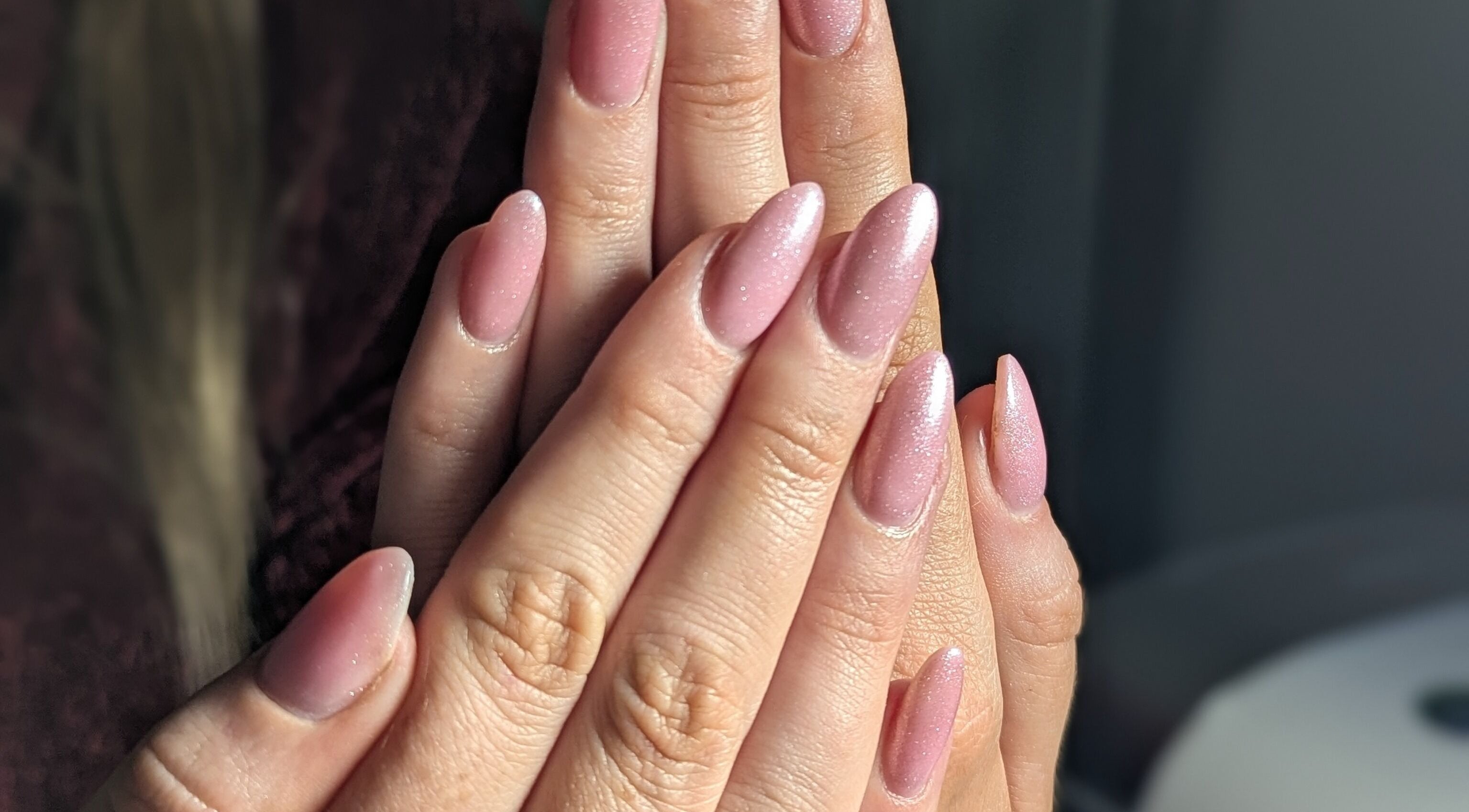 Close-up of sparkling pink nails at Quest Nails in Greystones, County Wicklow, IE.