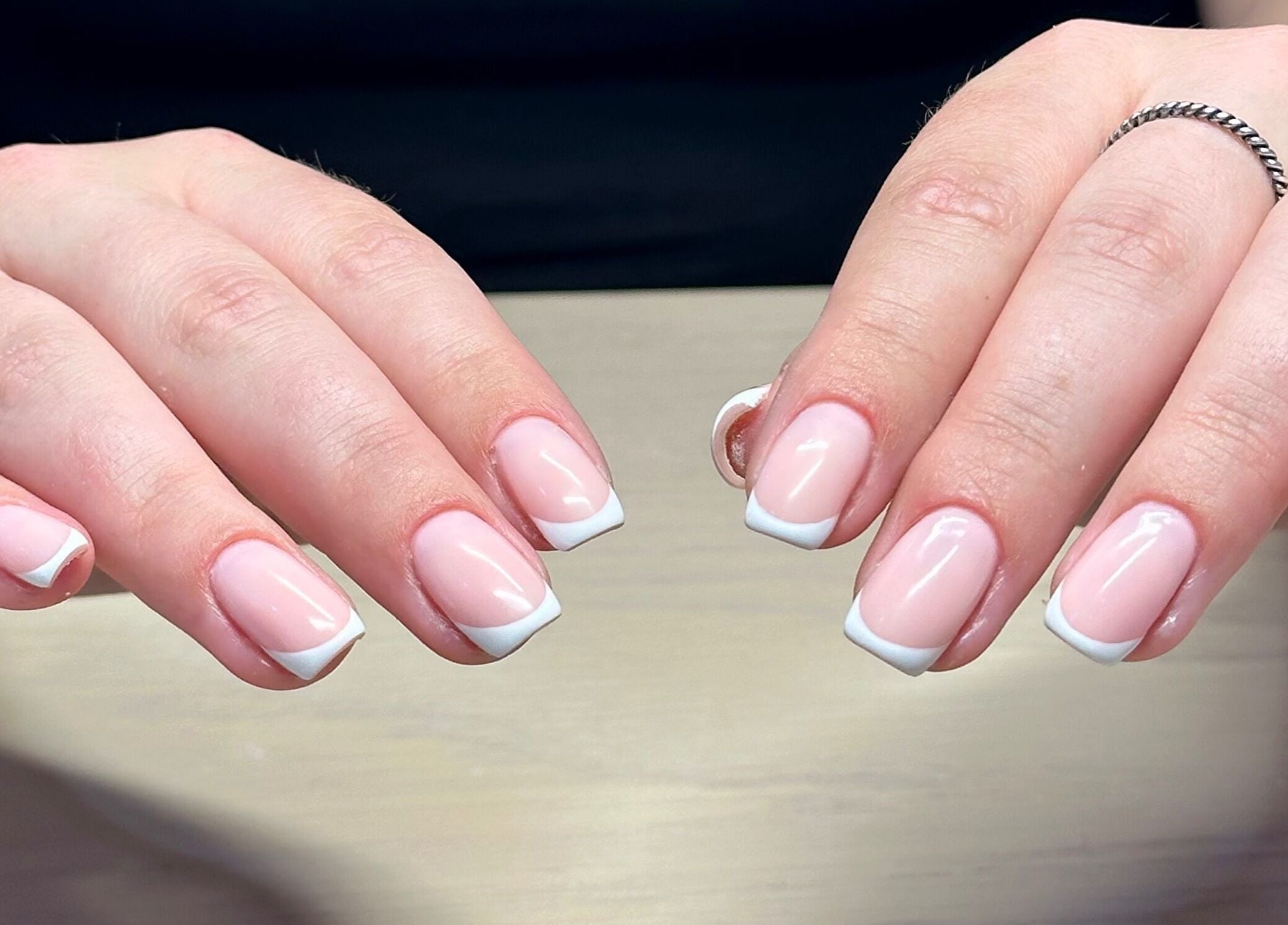 Close-up of French manicure at Bydarcyella, Birmingham, England, GB.