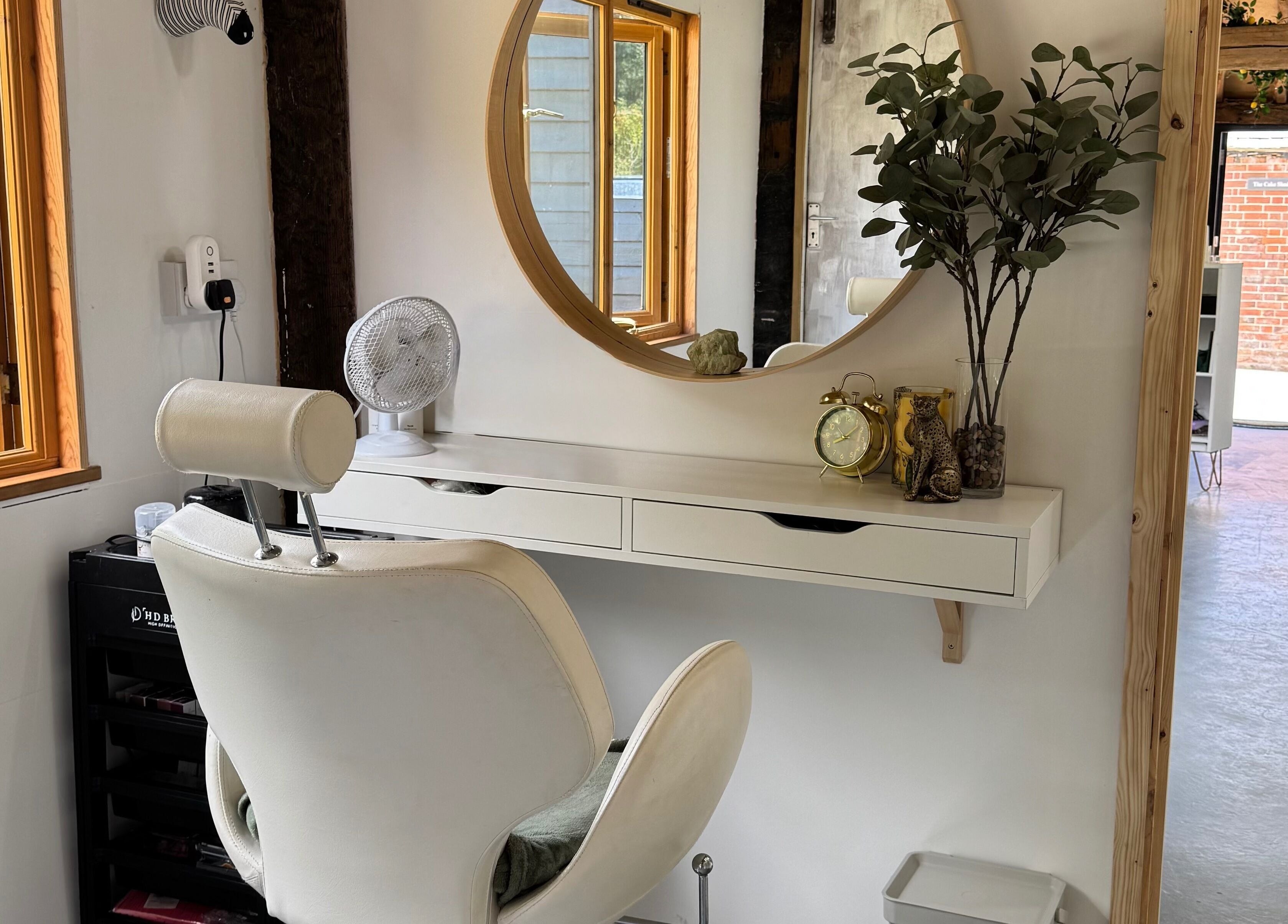 Elegant salon chair and mirror at Grace & Beauty, Hayling Island, England, GB.