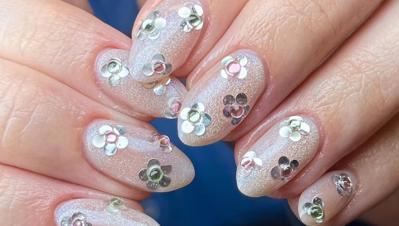 Close-up of glittery floral nail art at Fashi0n.Victim, Manchester, England, GB.