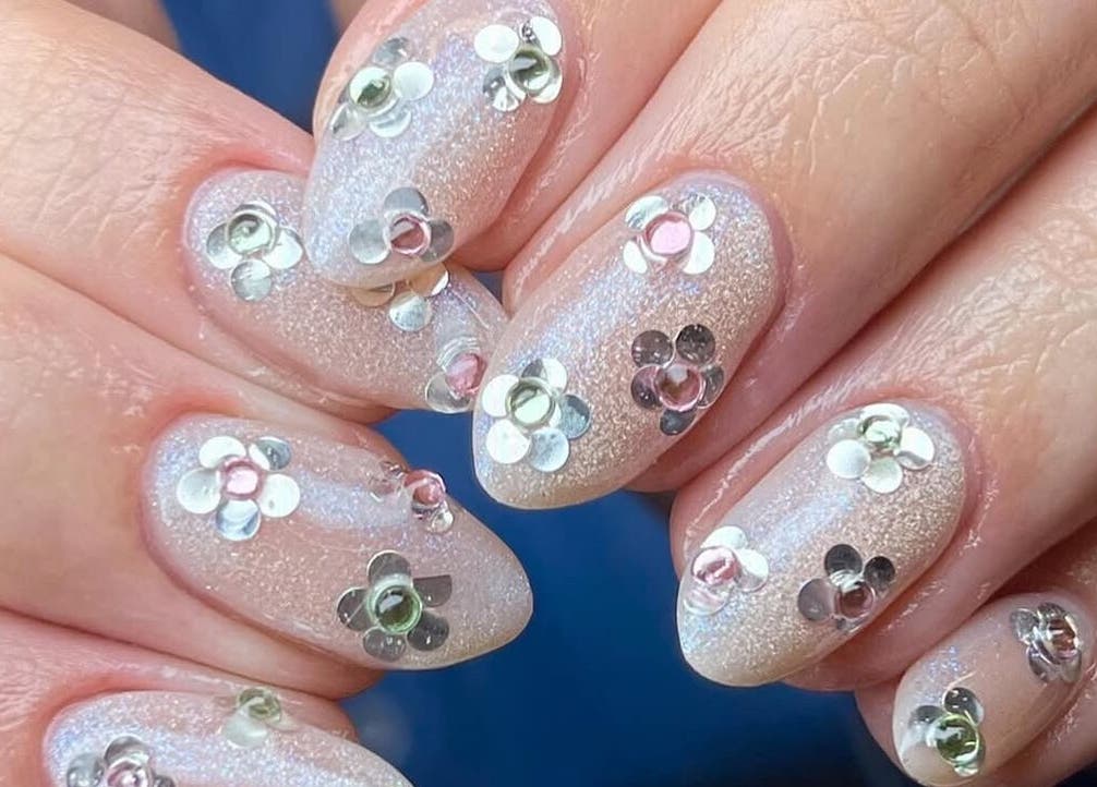 Close-up of glittery floral nail art at Fashi0n.Victim, Manchester, England, GB.