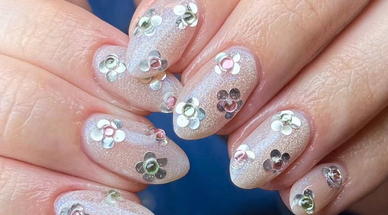Close-up of glittery floral nail art at Fashi0n.Victim, Manchester, England, GB.