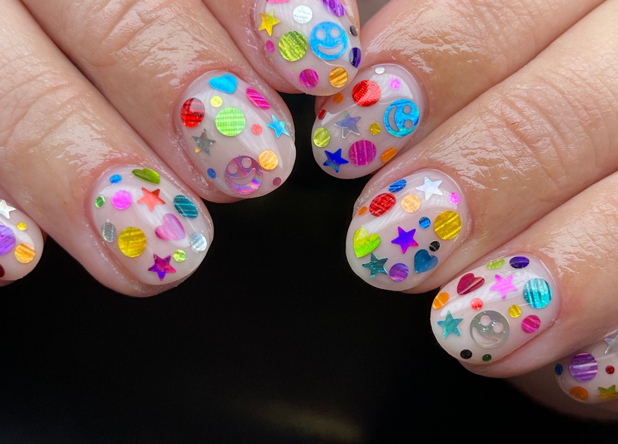 Colorful nail art with designs at Fashi0n.Victim in Manchester, England, GB.