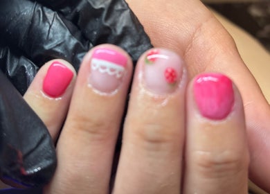 Bright manicure with floral and lace designs at Chantel Marie Nails & Beauty, Micklefield, England, GB.