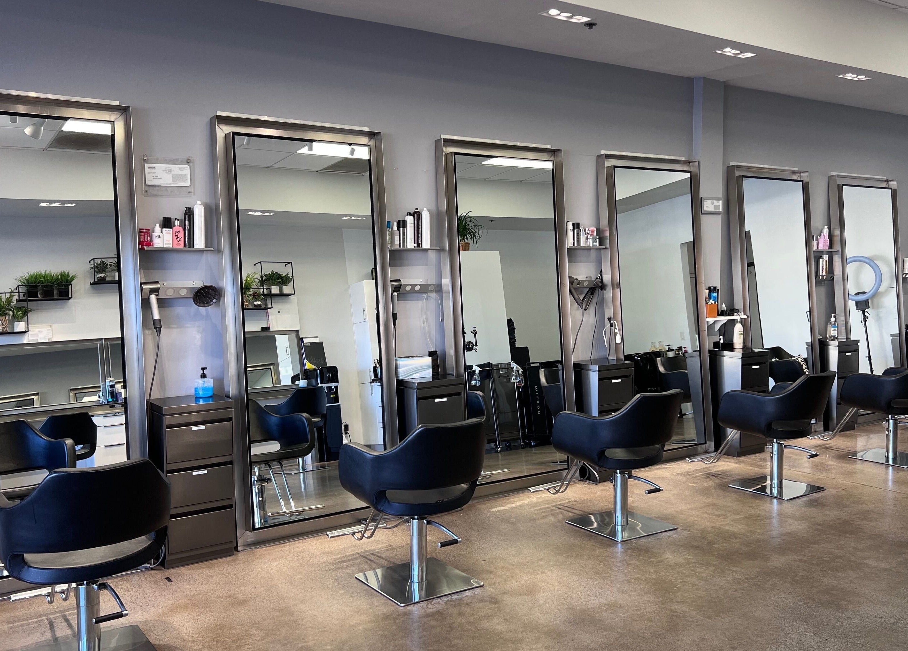 Elegant salon interior at Minimore极简造型, Rowland Heights, California, US, showcasing modern styling stations.