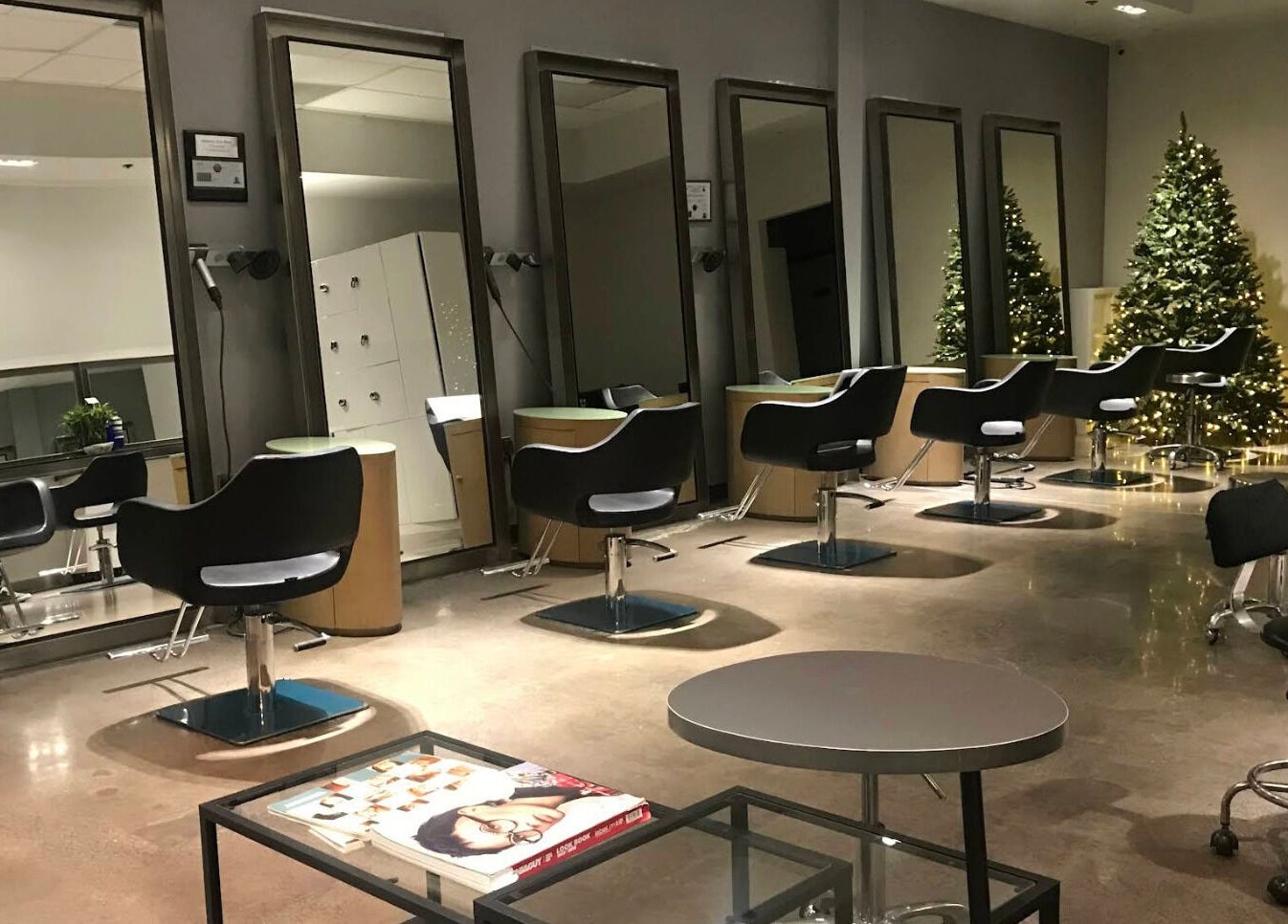 Modern salon interior at Minimore极简造型, Rowland Heights, California, US, featuring elegant styling chairs and Christmas decor.