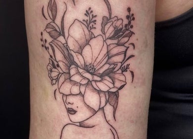 Detailed flower head tattoo by Ellipsis Tattoo Club, Paris, Île-de-France, FR.