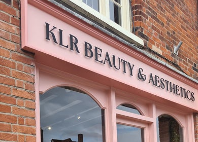 Charming exterior of Rhiannon's Beauty Box in Long Melford, England, GB with elegant signage.
