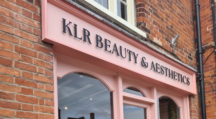 Charming exterior of Rhiannon's Beauty Box in Long Melford, England, GB with elegant signage.