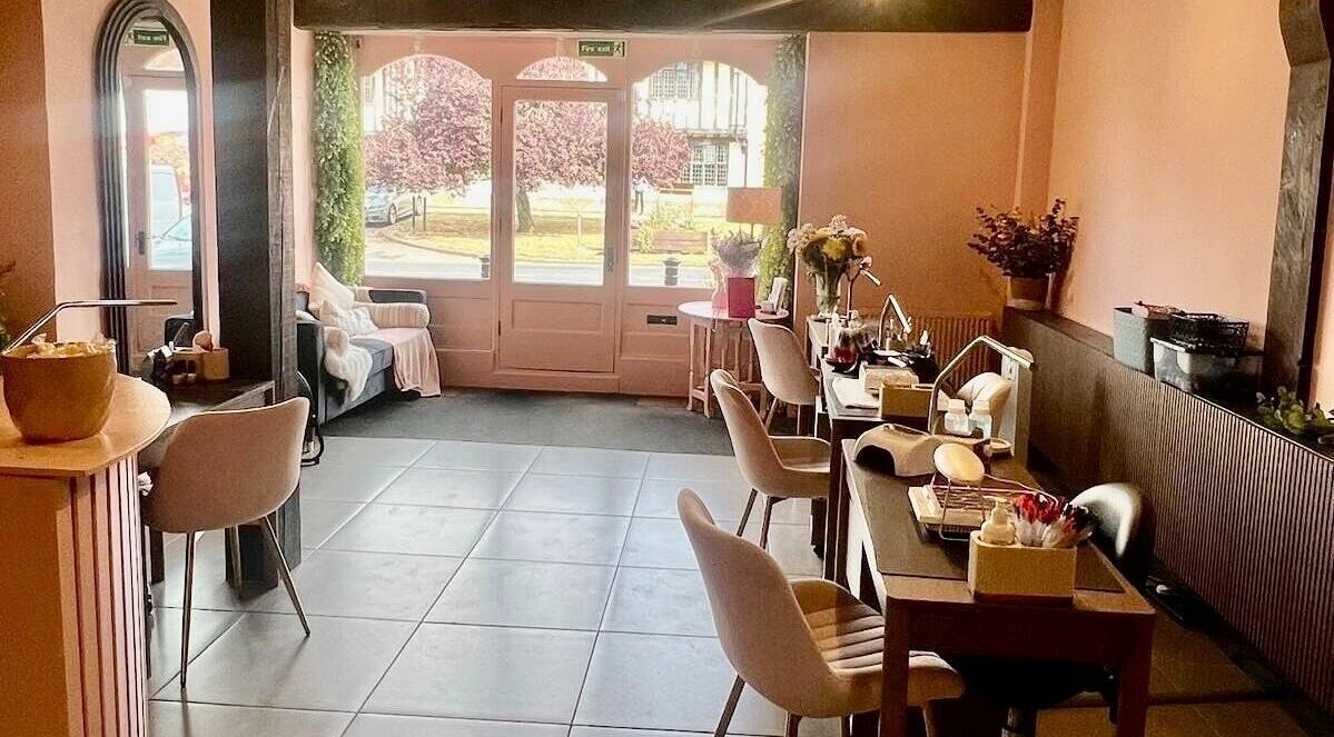 Elegant interior of Rhiannon's Beauty Box in Long Melford, England, GB with stylish seating and decor.