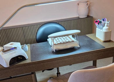 Chic nail station at Rhiannon's Beauty Box, Long Melford, England, GB, featuring modern tools and decor.