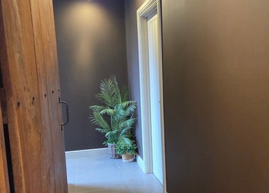 Calm entryway with plant decor at Rhiannon's Beauty Box, Long Melford, England, GB.