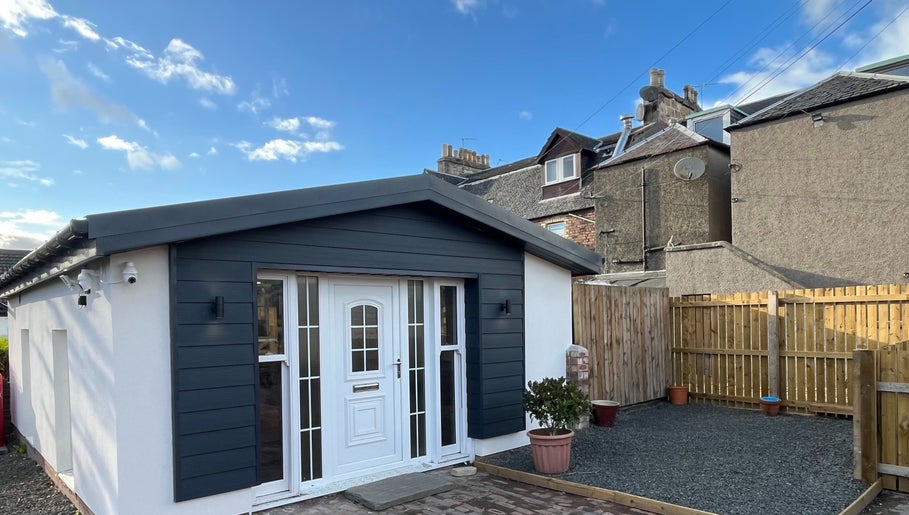 Modern exterior of Hidden Lane Hair in Winchburgh, Scotland, GB, showcasing stylish design and inviting entrance.
