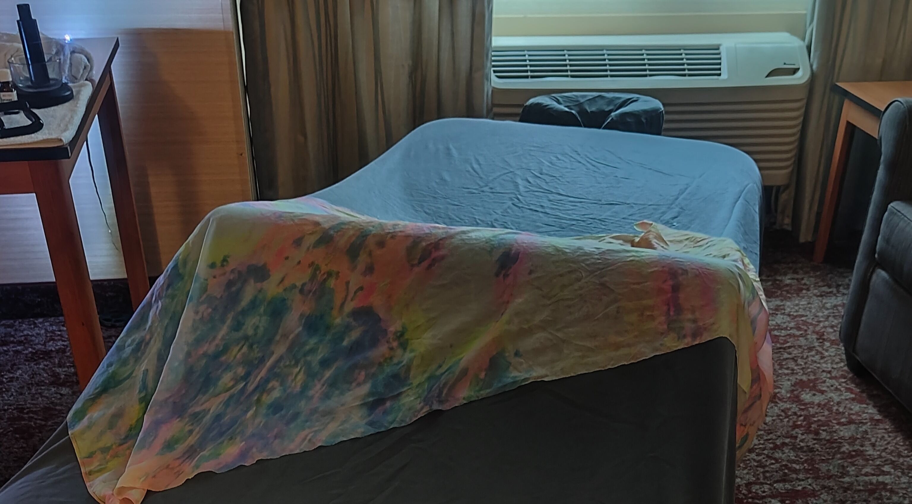 Relaxing therapy room with massage table in Salt Lake City, Utah at NA, Utah, US, featuring soothing decor.