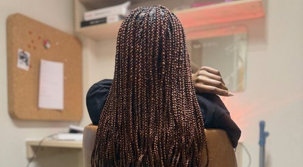 Intricate braids styling at Faitcy Beauty Salon in Liverpool, England, GB. A perfect blend of artistry and care.