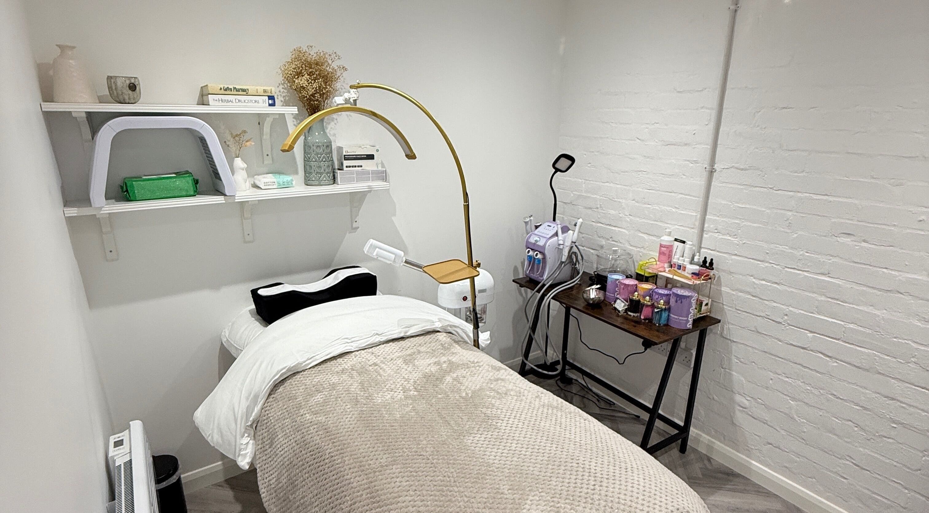 Treatment room at Haus Of Zizi, Newcastle upon Tyne, England, GB, featuring a cozy massage table and soothing decor.