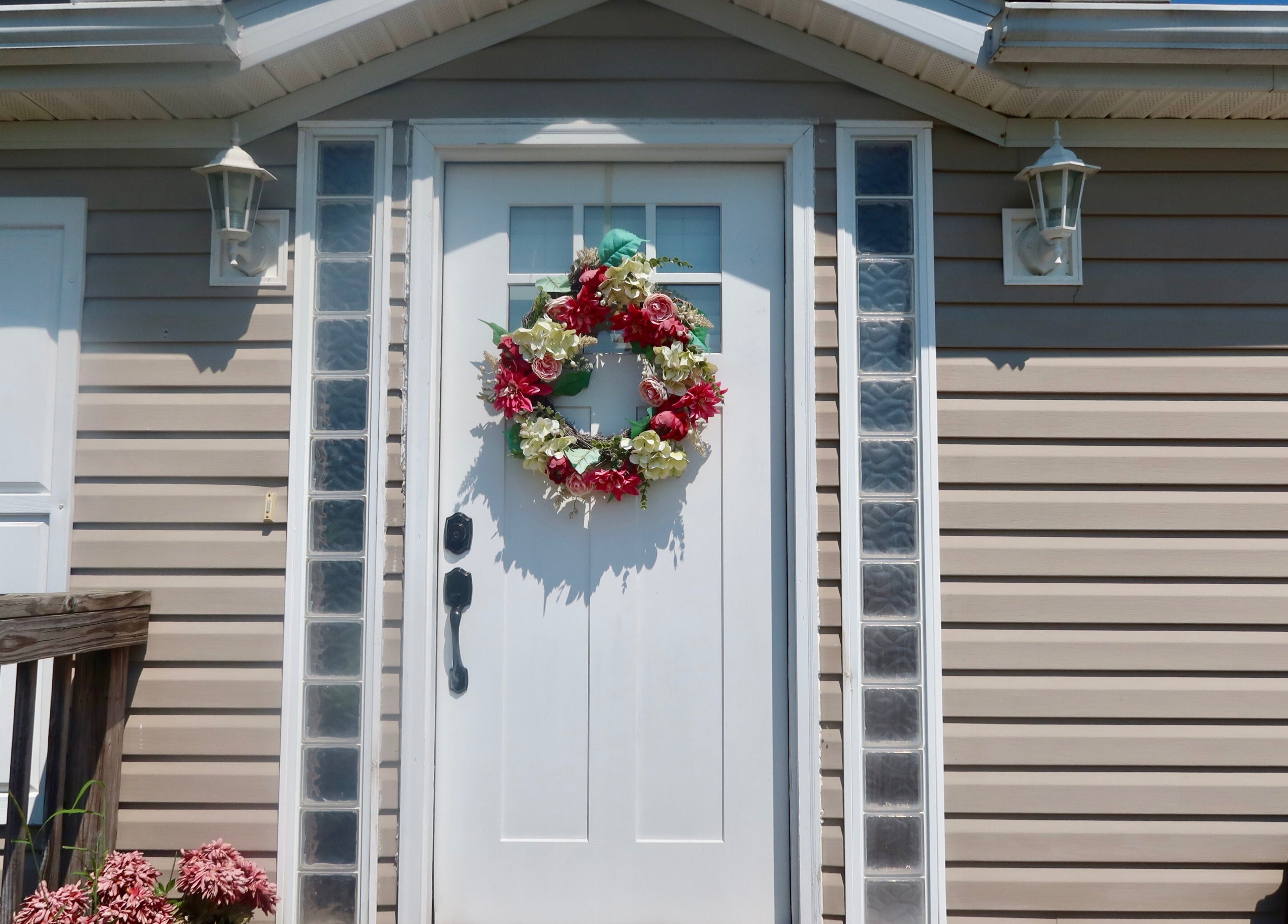 Elegant front door with a floral wreath at KD Designs, Lawrenceburg, Indiana, US.