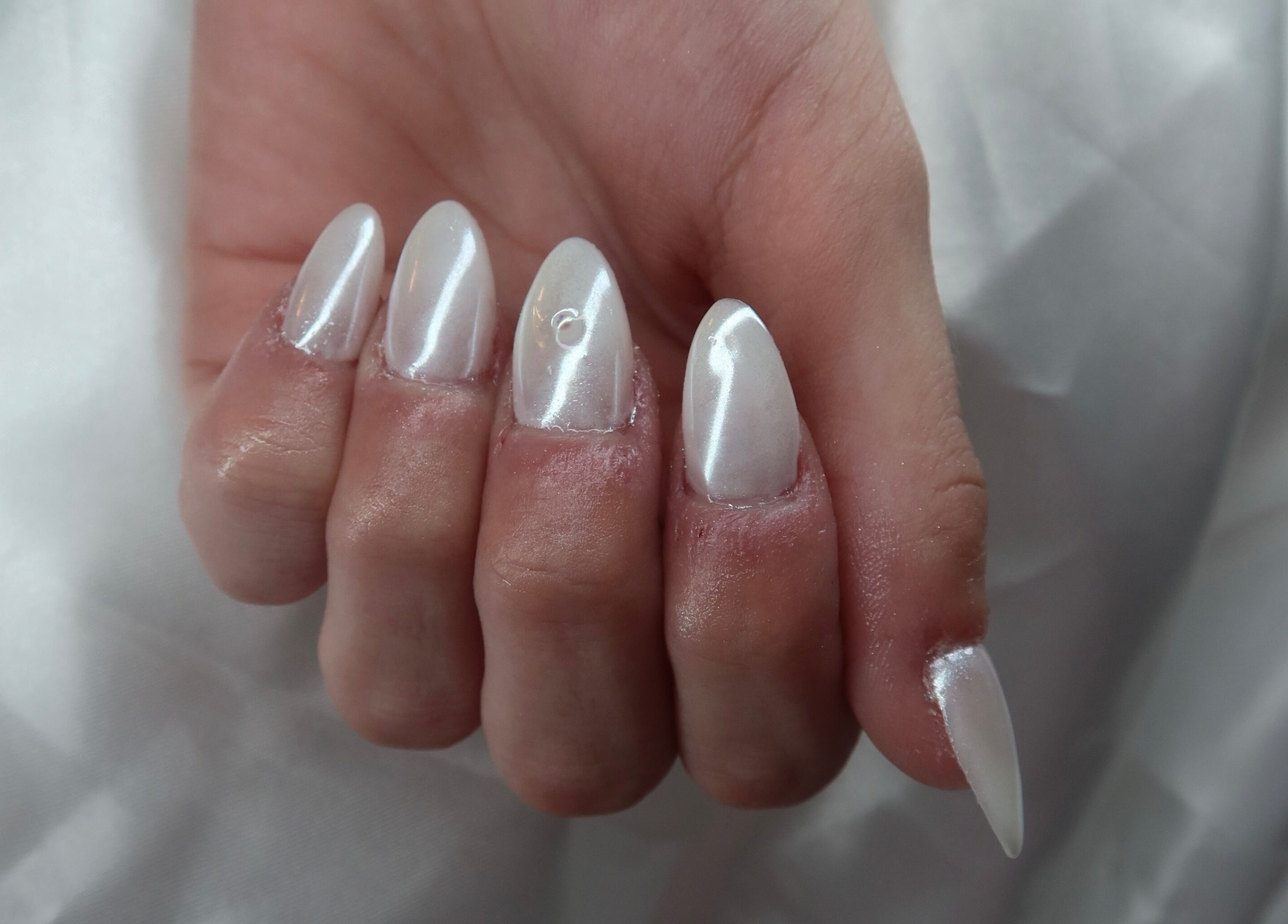 Elegant pearly manicured nails at KD Designs, Lawrenceburg, Indiana, US.