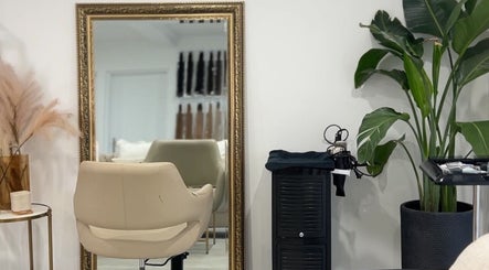 Elegant salon setup with a mirror at Lily Solomon hair in Melbourne, Victoria, AU, showcasing a modern vibe.