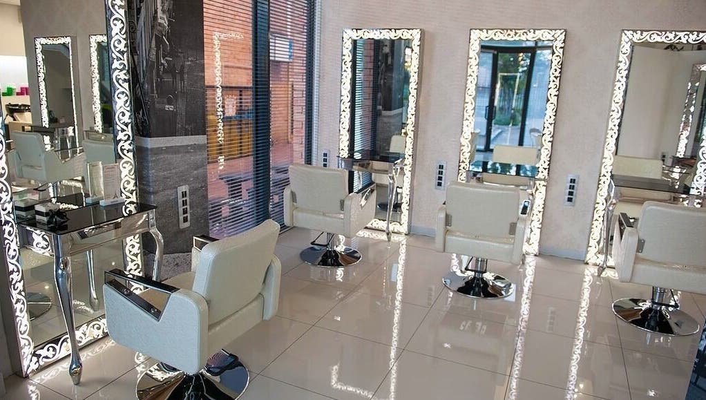 Chic interior of Veaudry International JOHANNESBURG showing styling chairs and mirrors in Johannesburg, Gauteng, ZA.